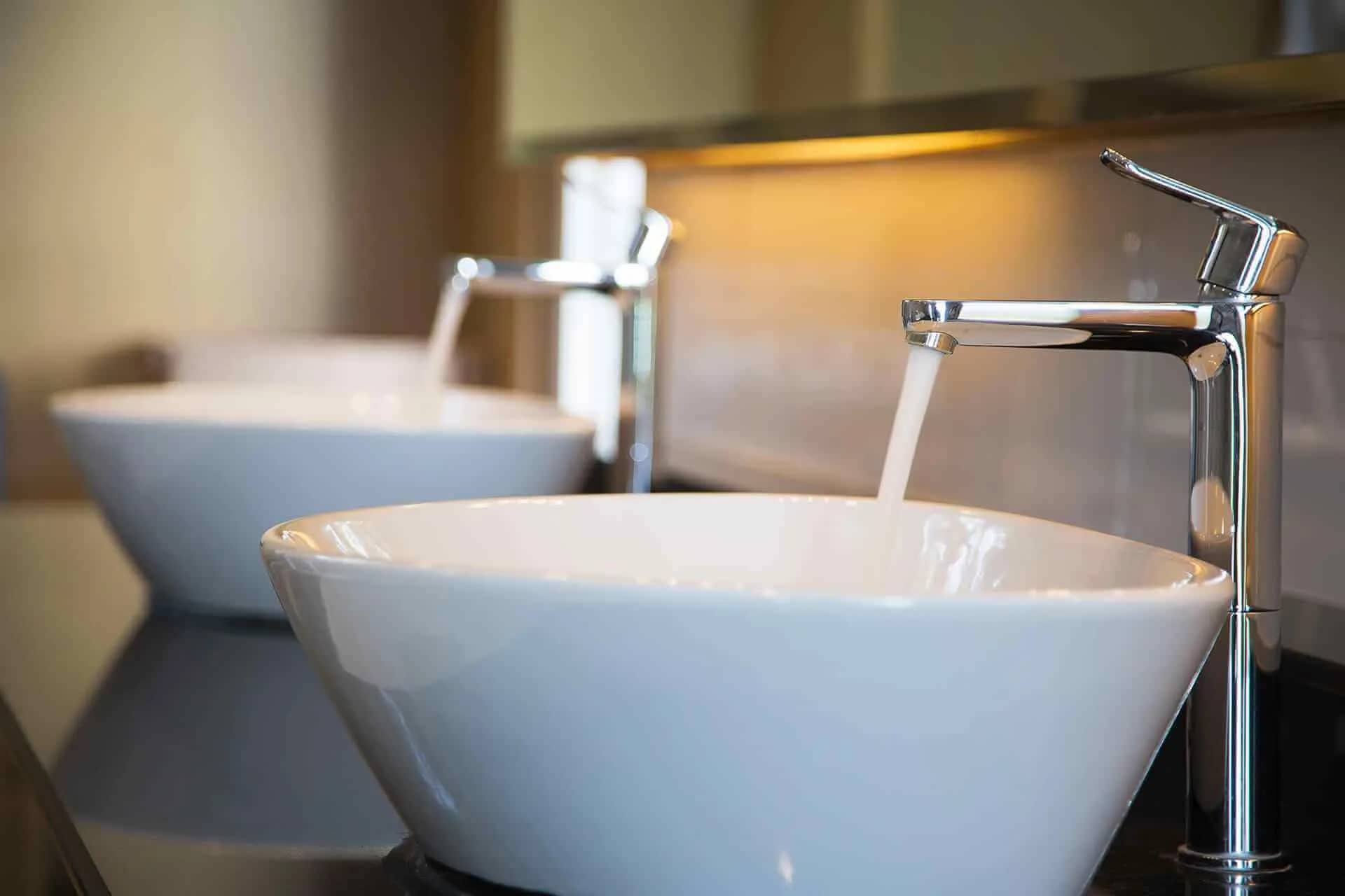 Basins and chrome mixer faucets installed